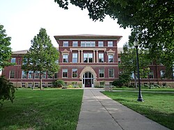 white university during daytime