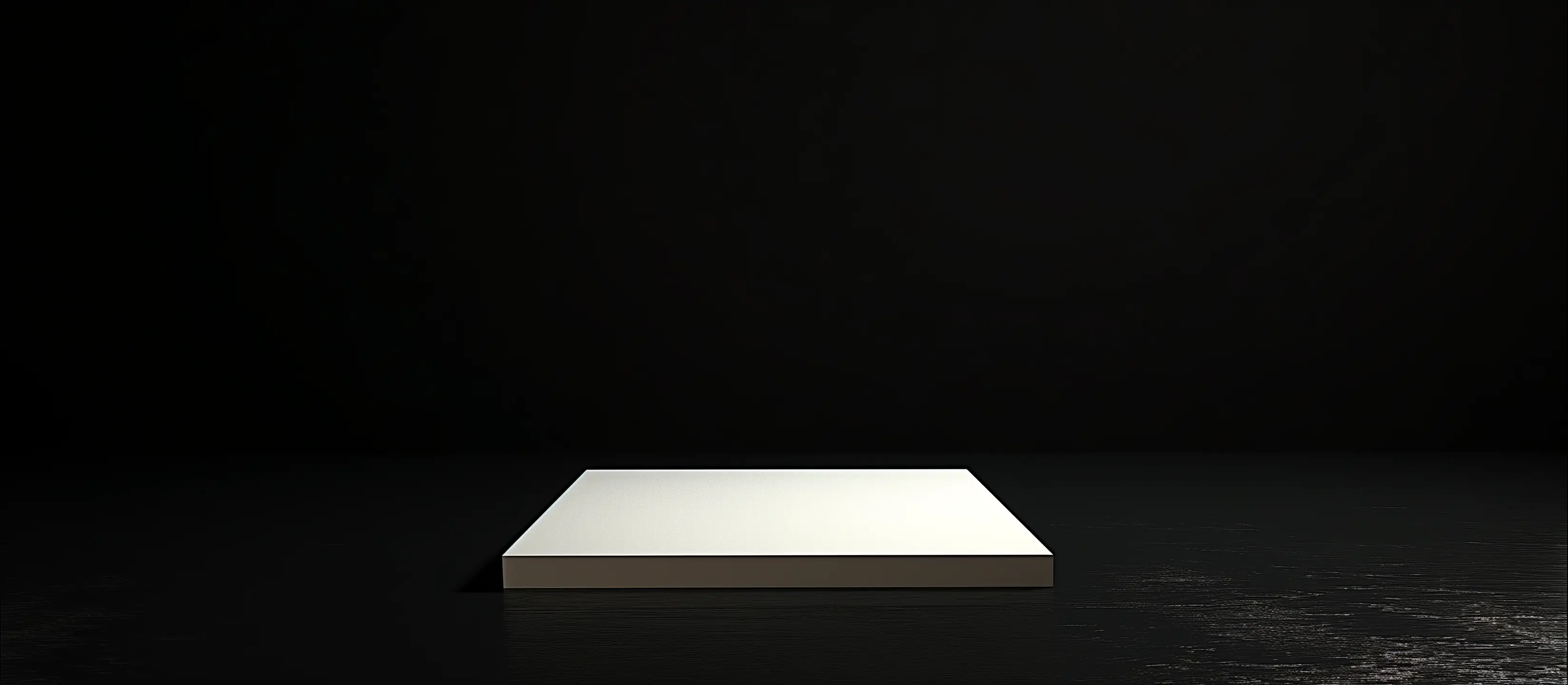 Minimalist dark platform with a central light source.