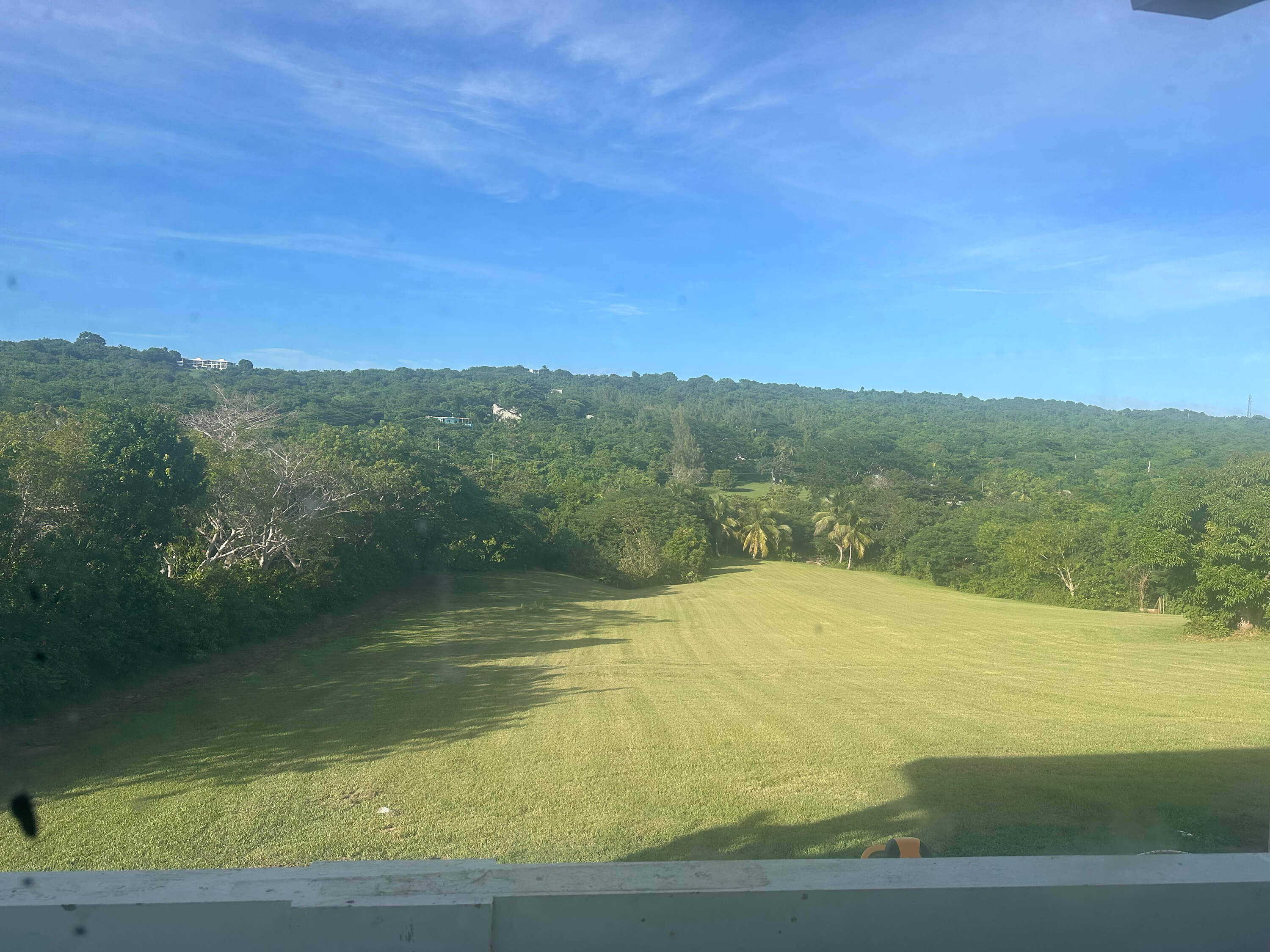 Scenic view from the window of Room 3 at Club Vieques, with lush greenery and tropical surroundings.