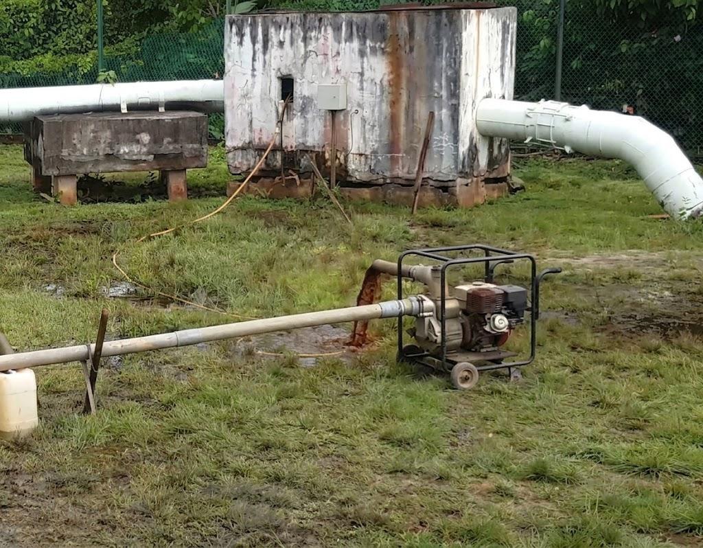 Historical image showing disposal of sludge and mud.
