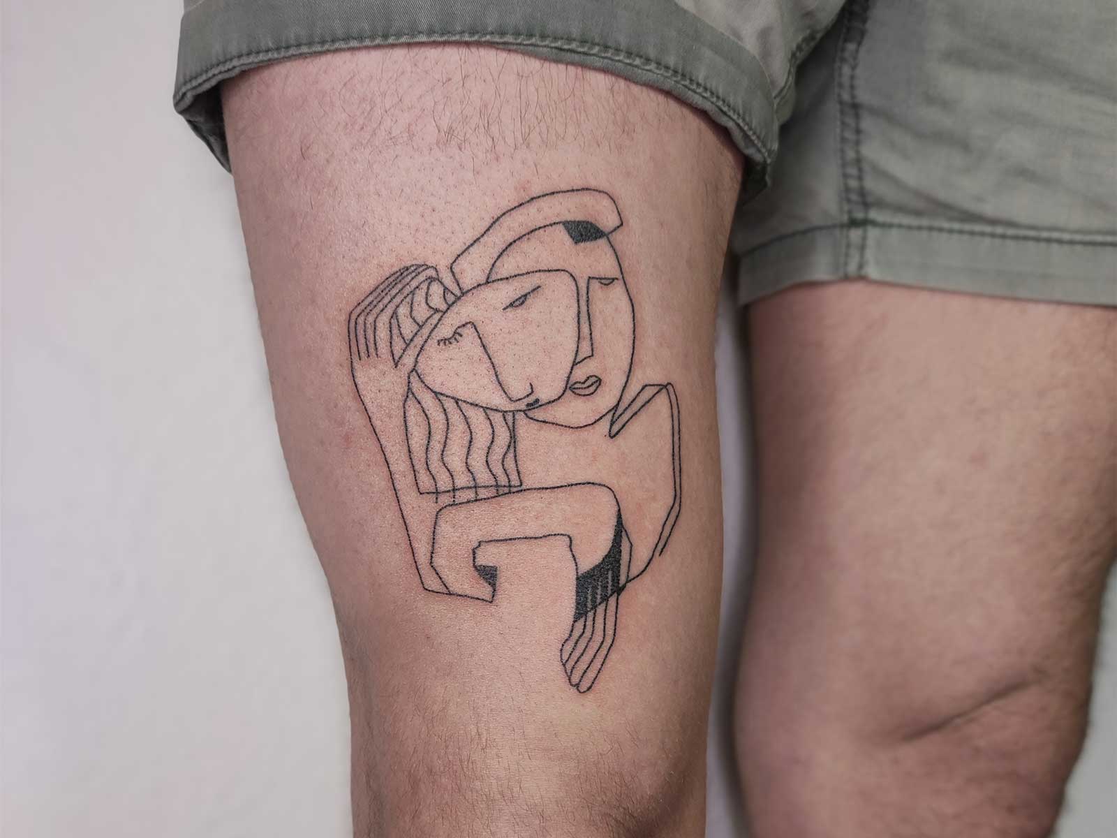 abstract faces tattoo