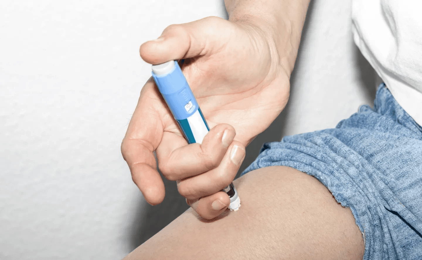 Person injecting medication - How Does Semaglutide Work