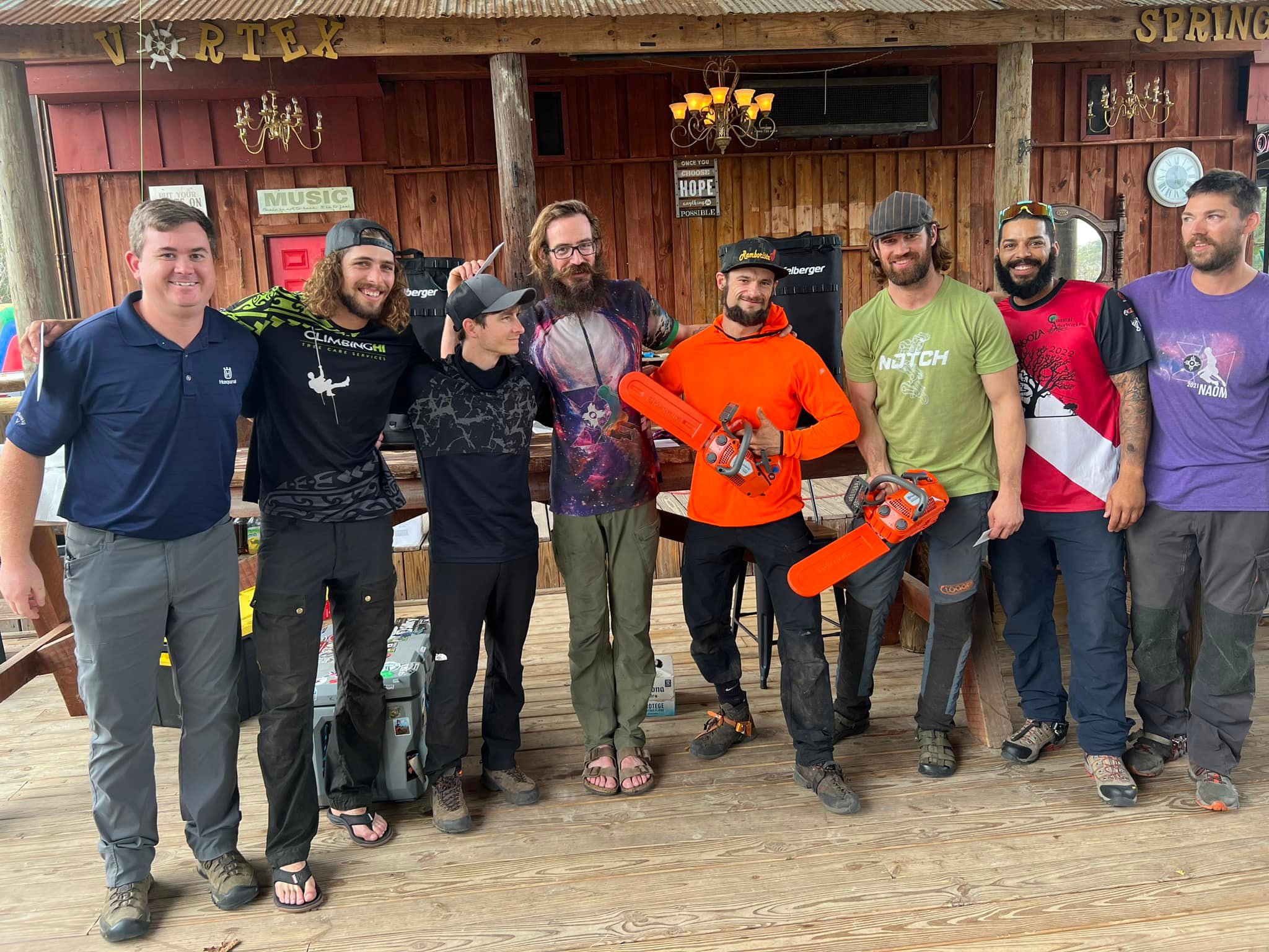 treeapalooza 2022 volunteers and organizers and sponsors gathered under pavilion at vortex spring