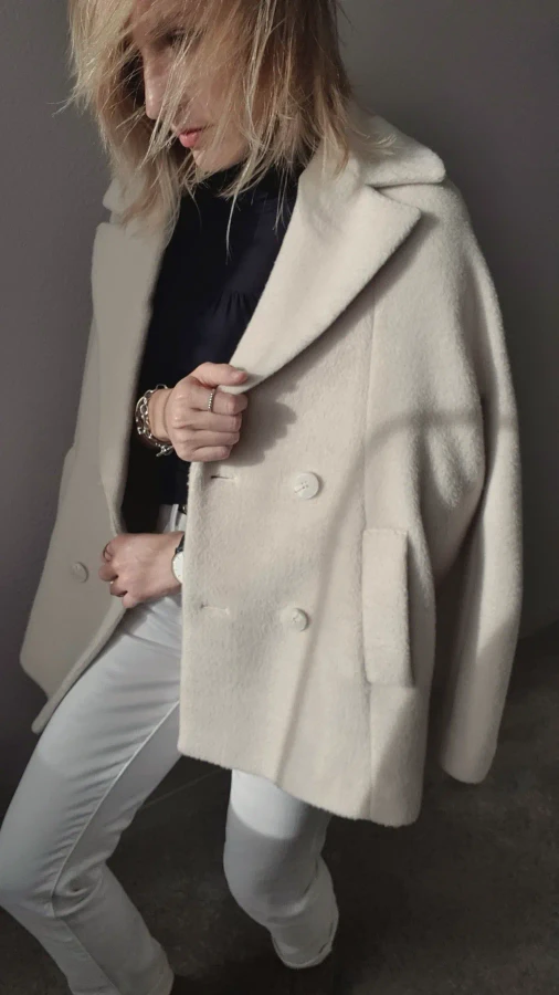 Cream boucle coat, close crop