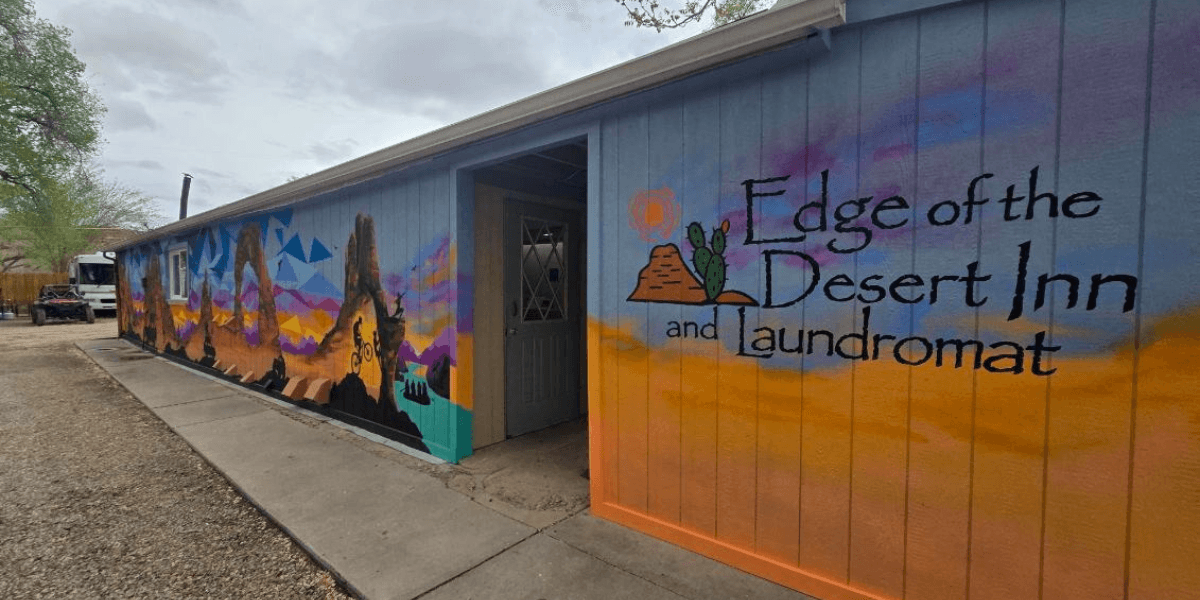 Edge of the Desert lodging blending art and hospitality, offering pet friendly stays, murals, and immersive experience for Moab Arts Festival visitors.