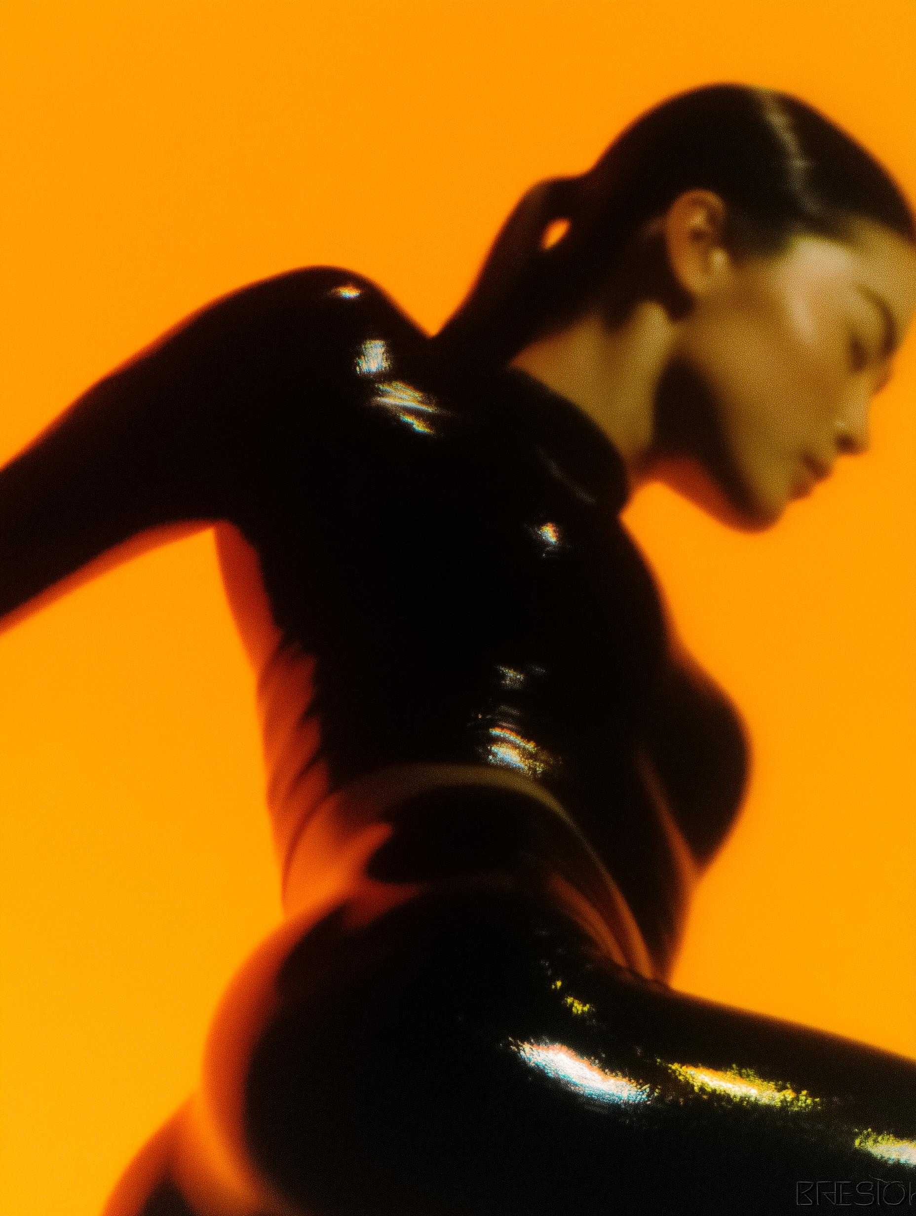 Blurred female athlete in dark outfit with warm lighting