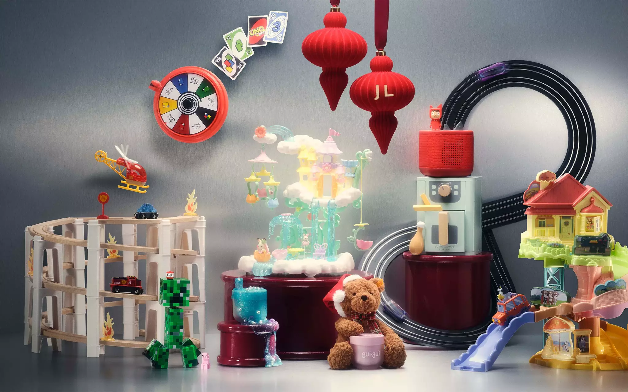 two black and white dogs near lighted wreath