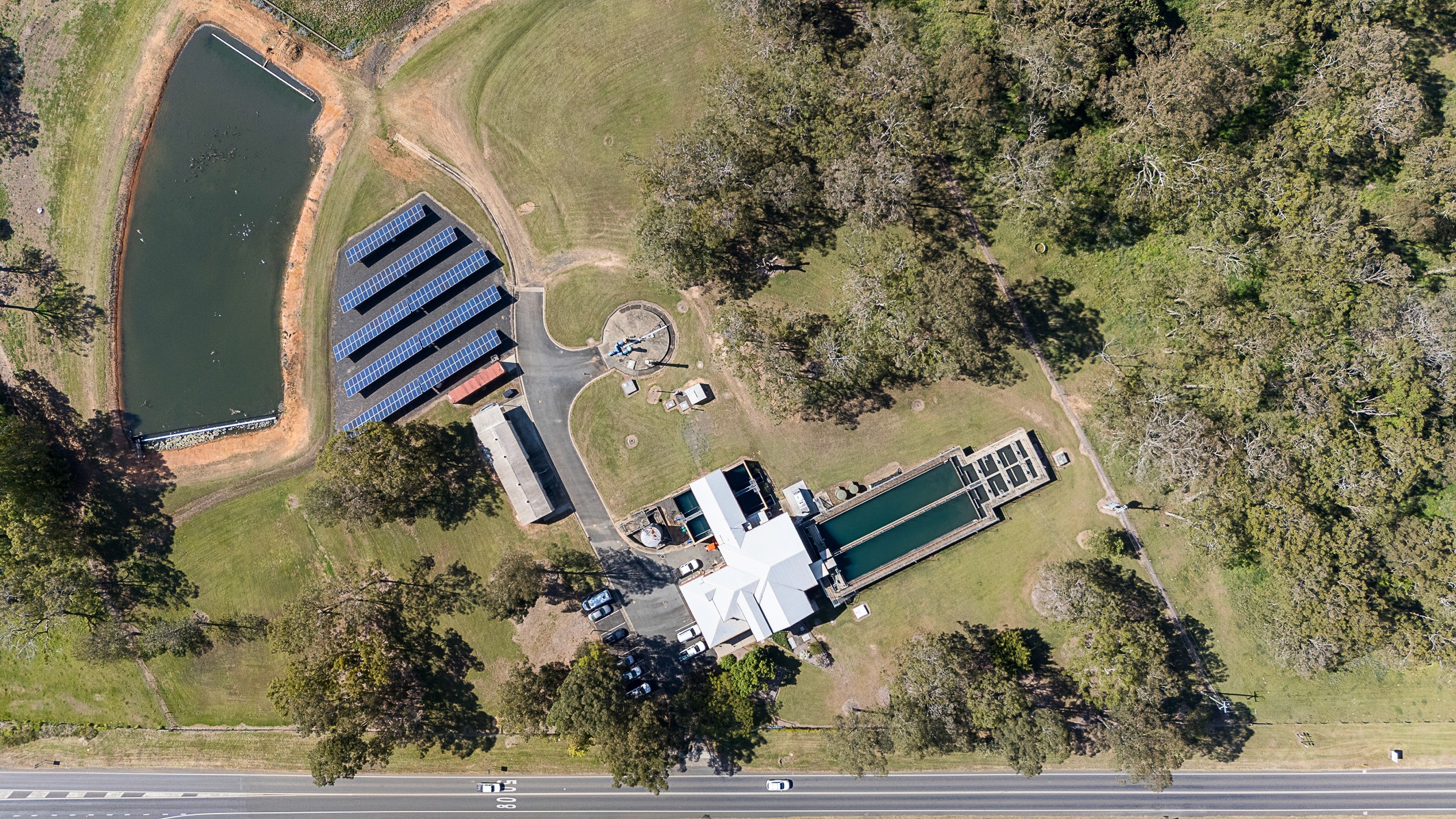Aerial view of circular clarifiers at a sewage treatment plant project managed by Uminex for local government