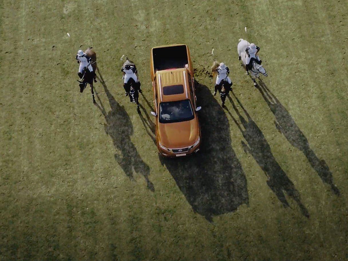 Rooftops of a coastal town with the sea in background