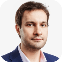 A portrait of Gaidar Magdanurov, a team member.