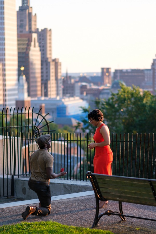 Outdoor portrait session overlooking a city skyline