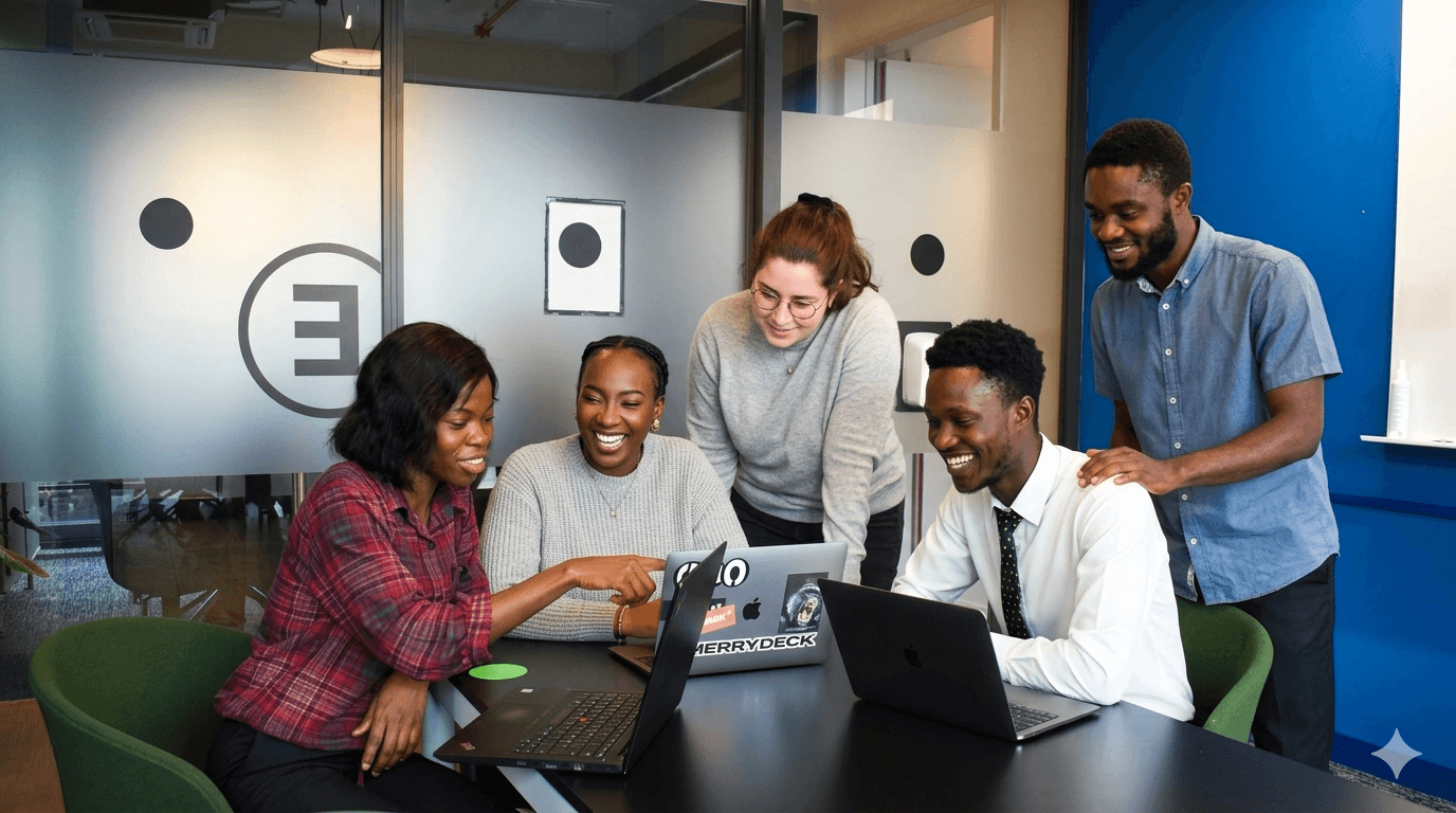 people sitting on chair in front of laptop computers