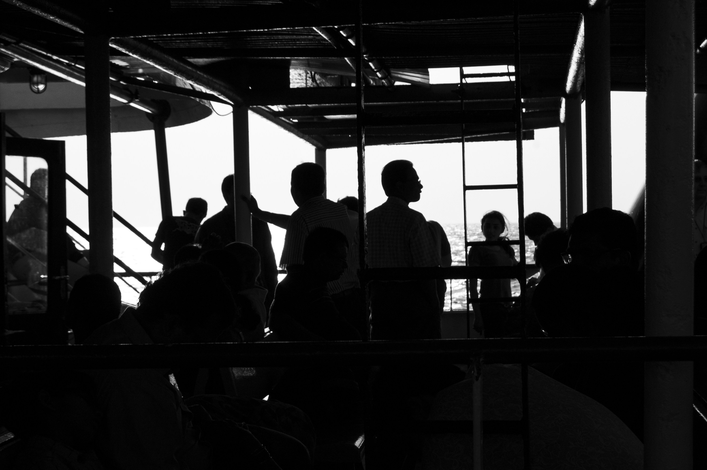 a black and white photo of a group of people