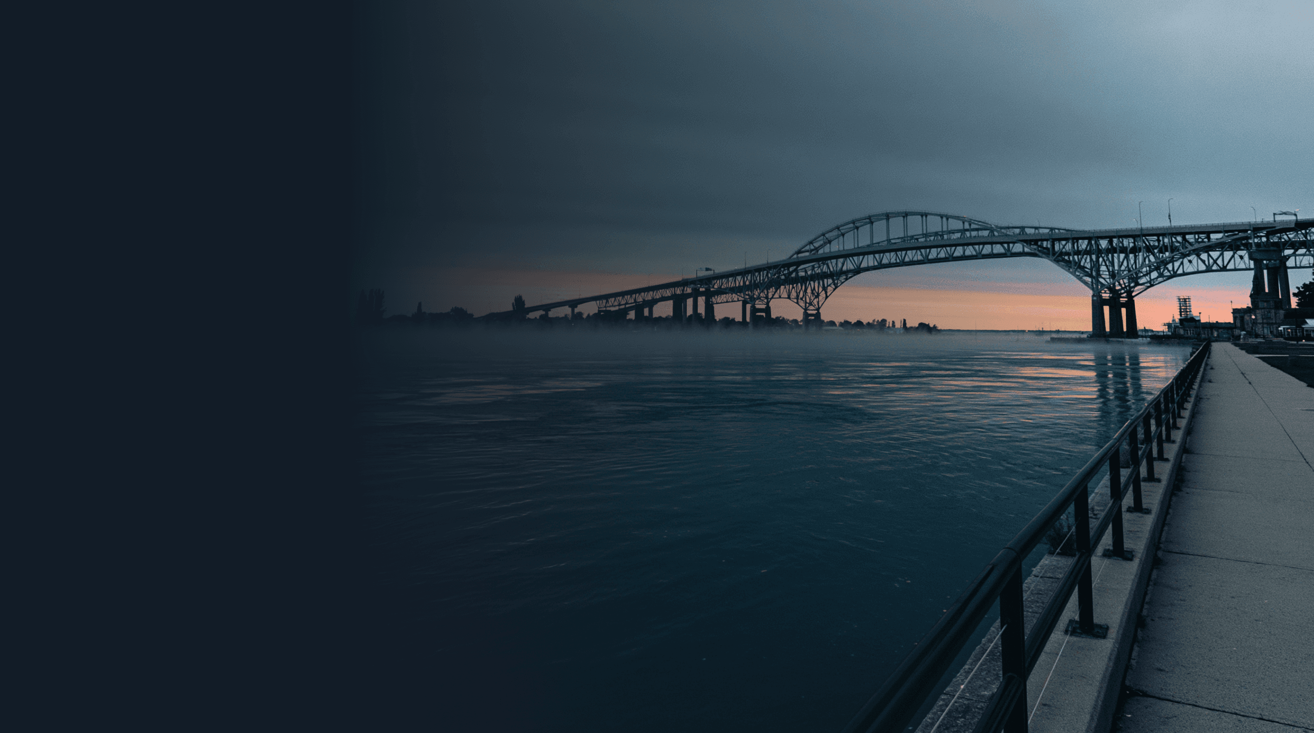 Lake Huron at sunrise from Port Huron waterfront with Bluewater Bridge