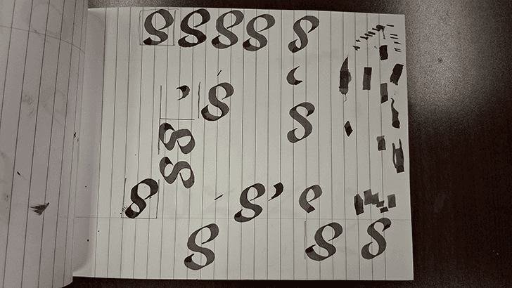 Sketches of the letter s.
