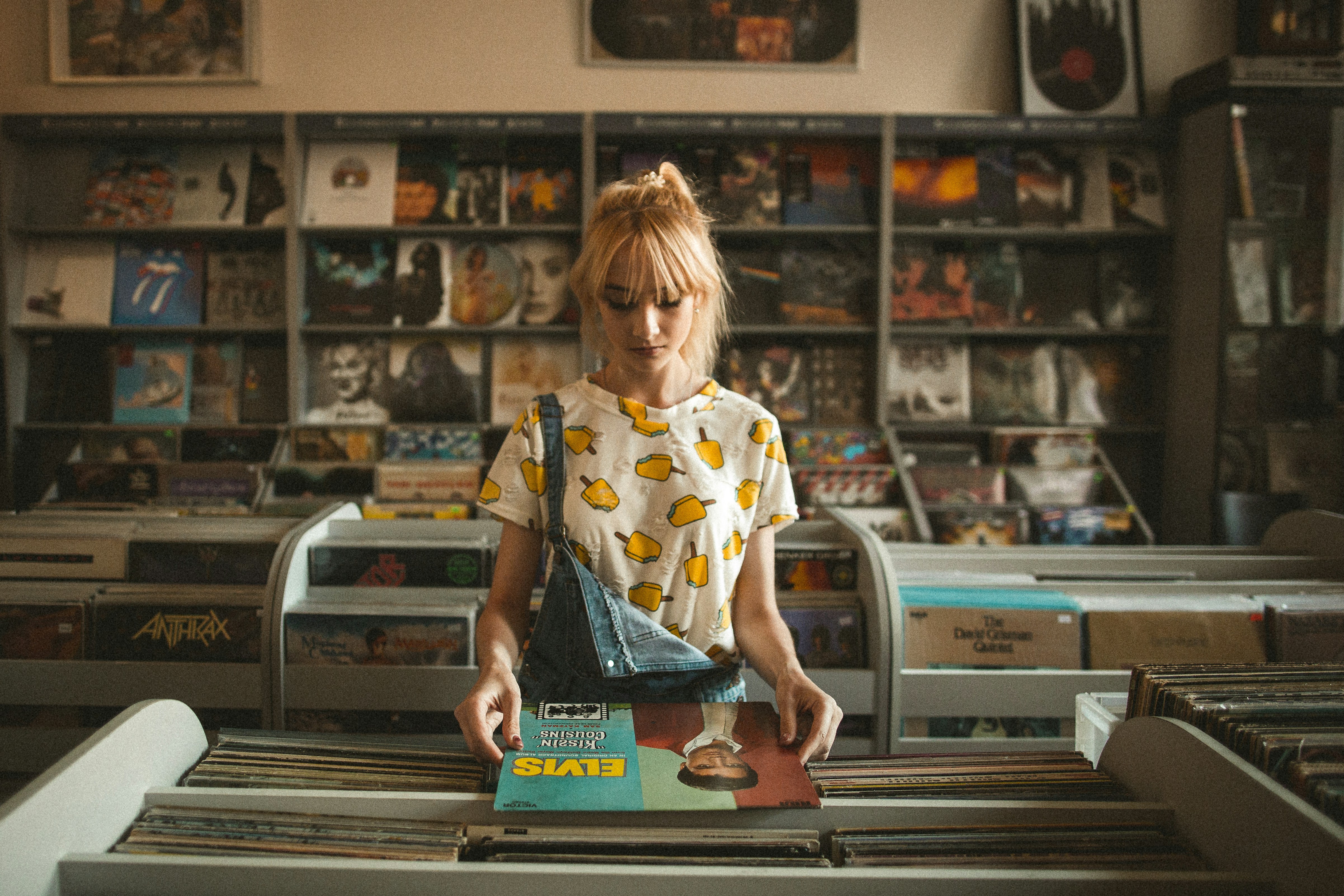 Girl Standing in Music Shop - Best DAW