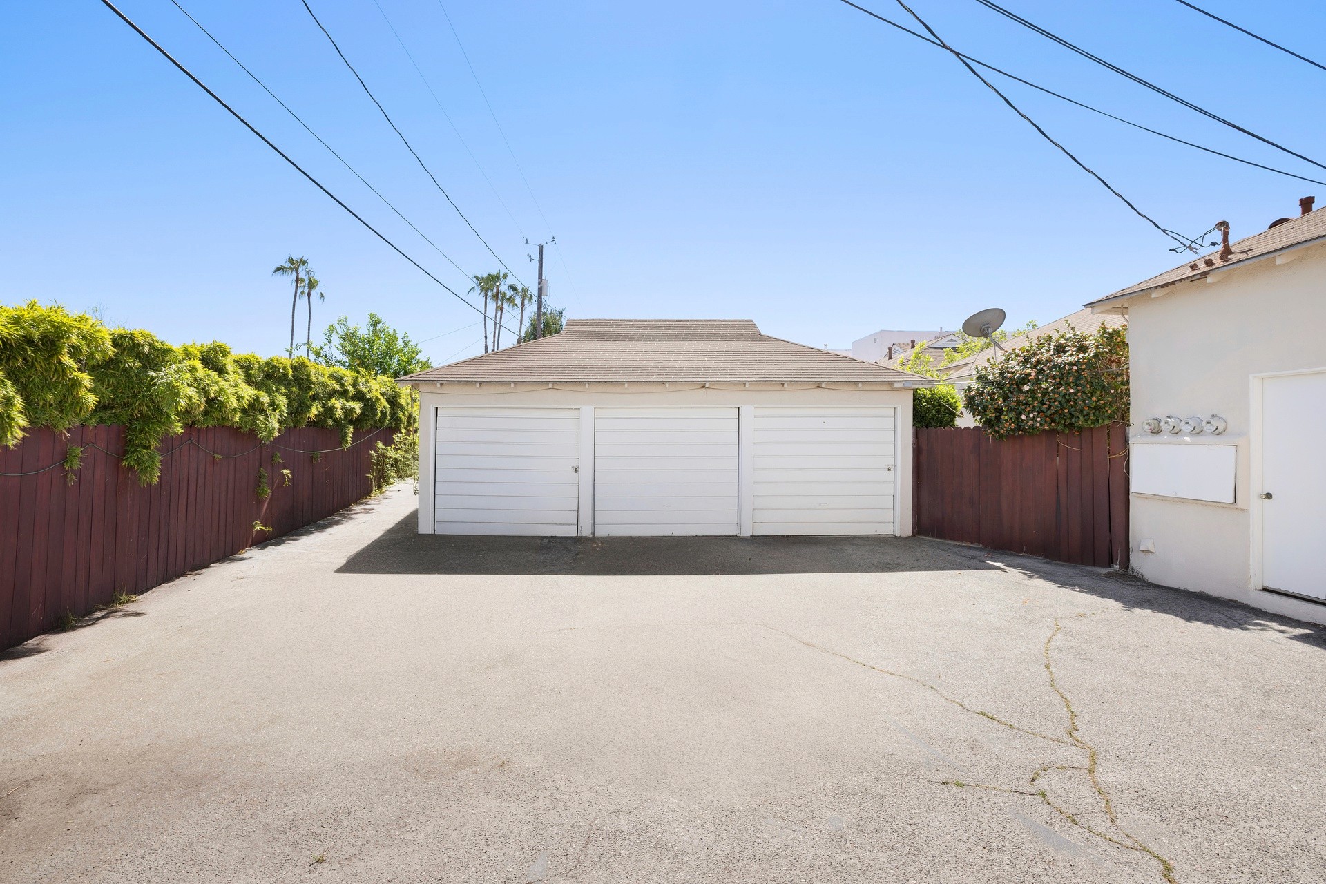 Rear garage parking area at 242 n cordova st multifamily investment property.