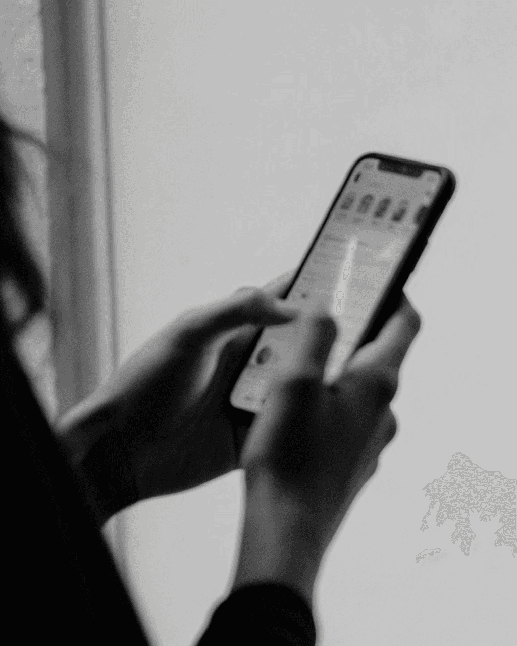 a woman scroling through social media on her phone