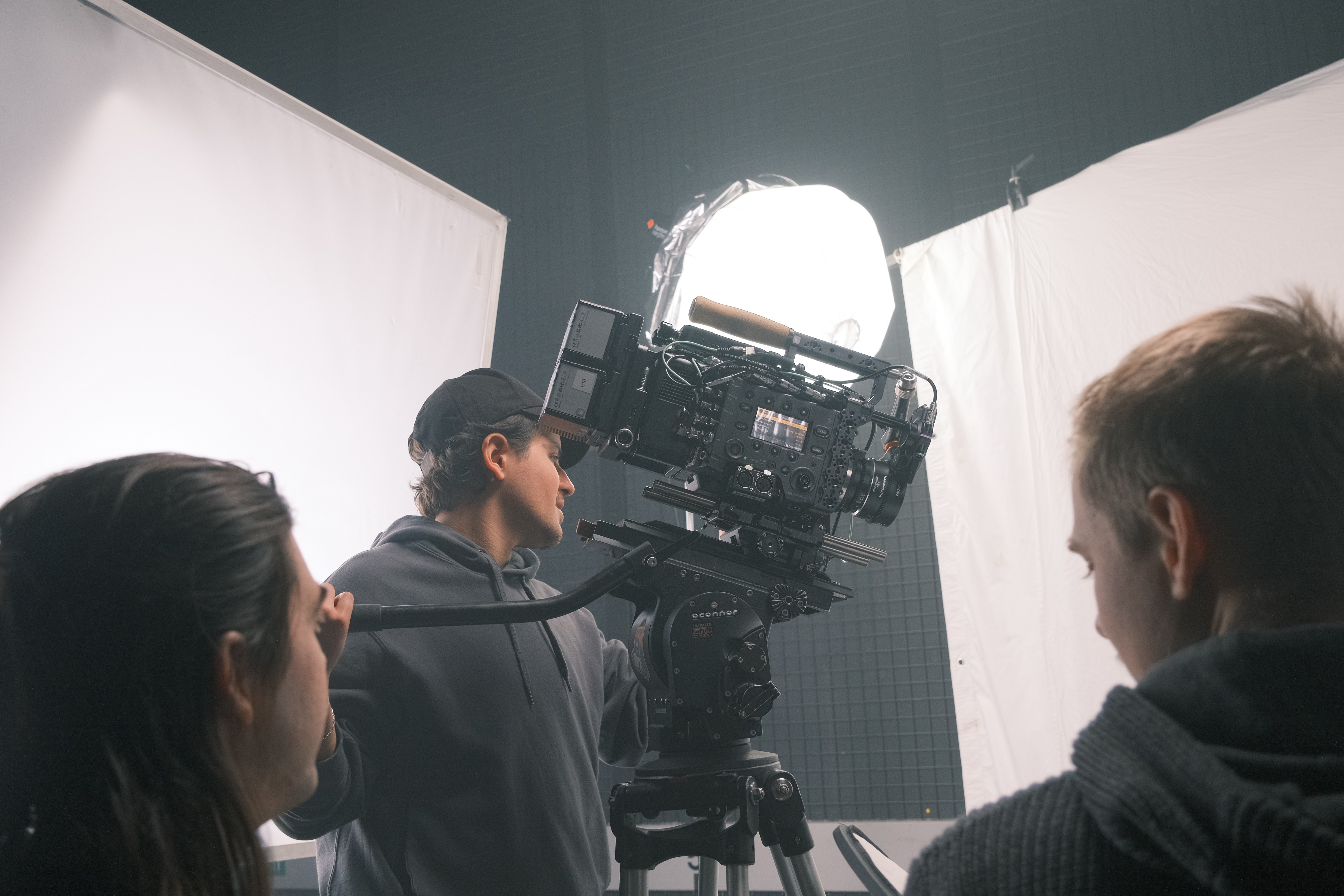 Crew gathering around a camera
