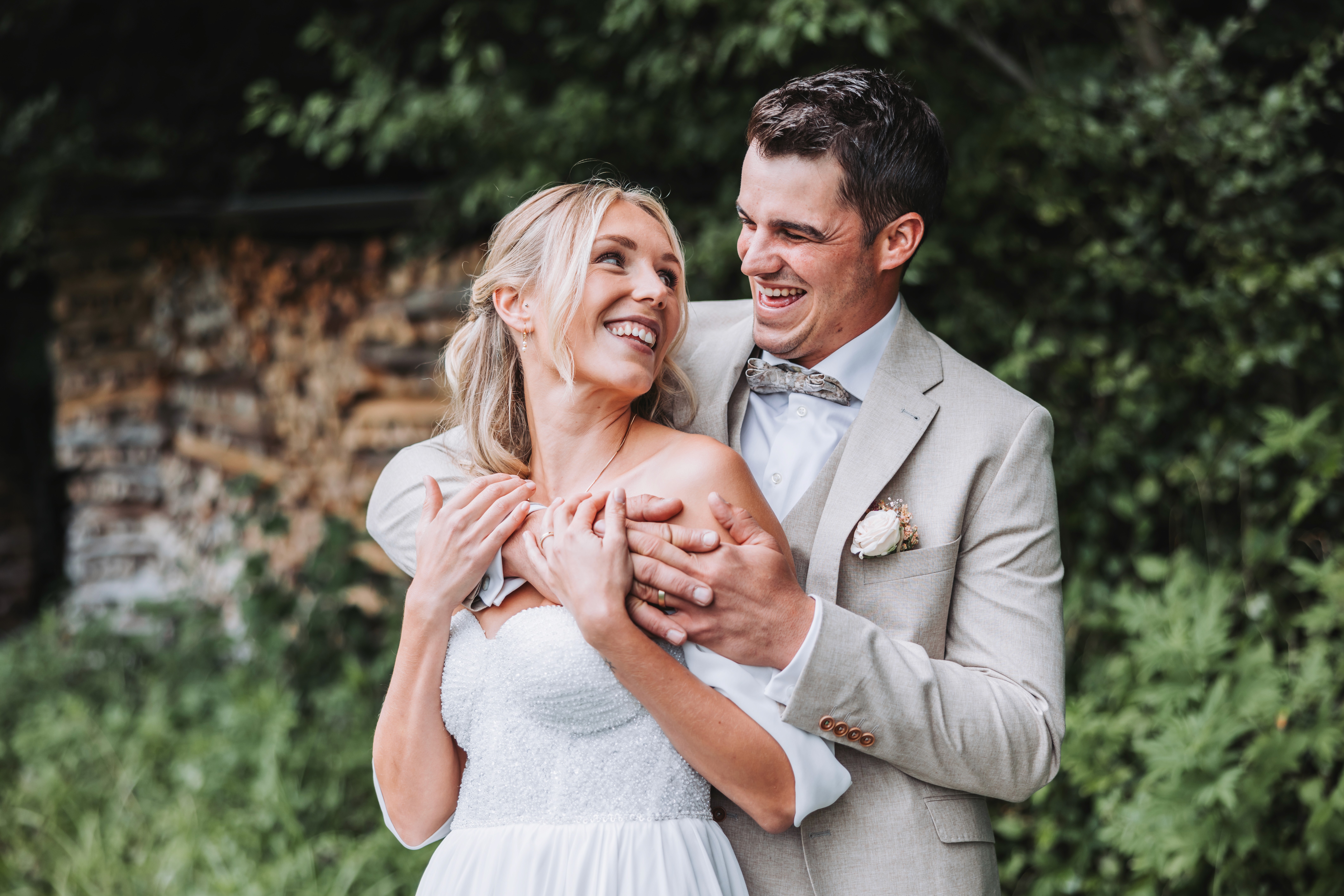 Minimalist floral branch with white flowers and yellow centers casting soft shadows