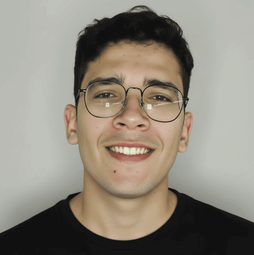 Portrait of a person in dark clothing speaking on a phone