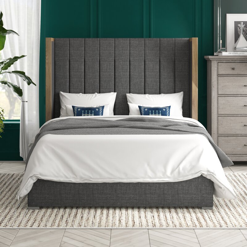 The grasser upholstered bed blends modern aesthetics with practical design for any setting.