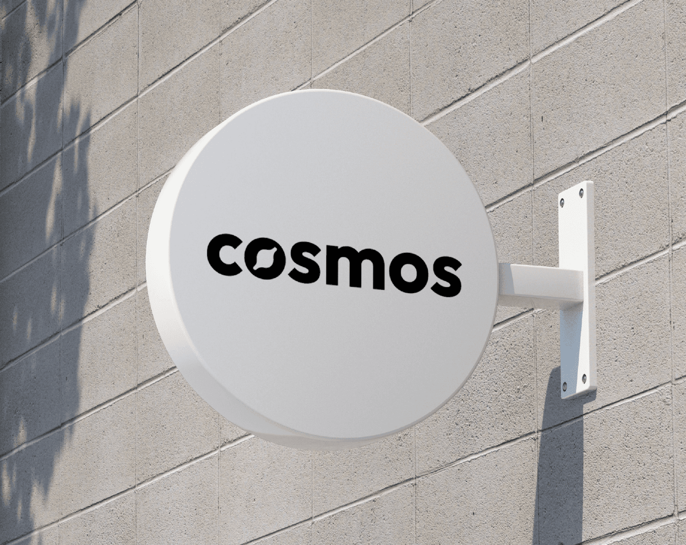 Close up of a sign with the Cosmos logo on it.