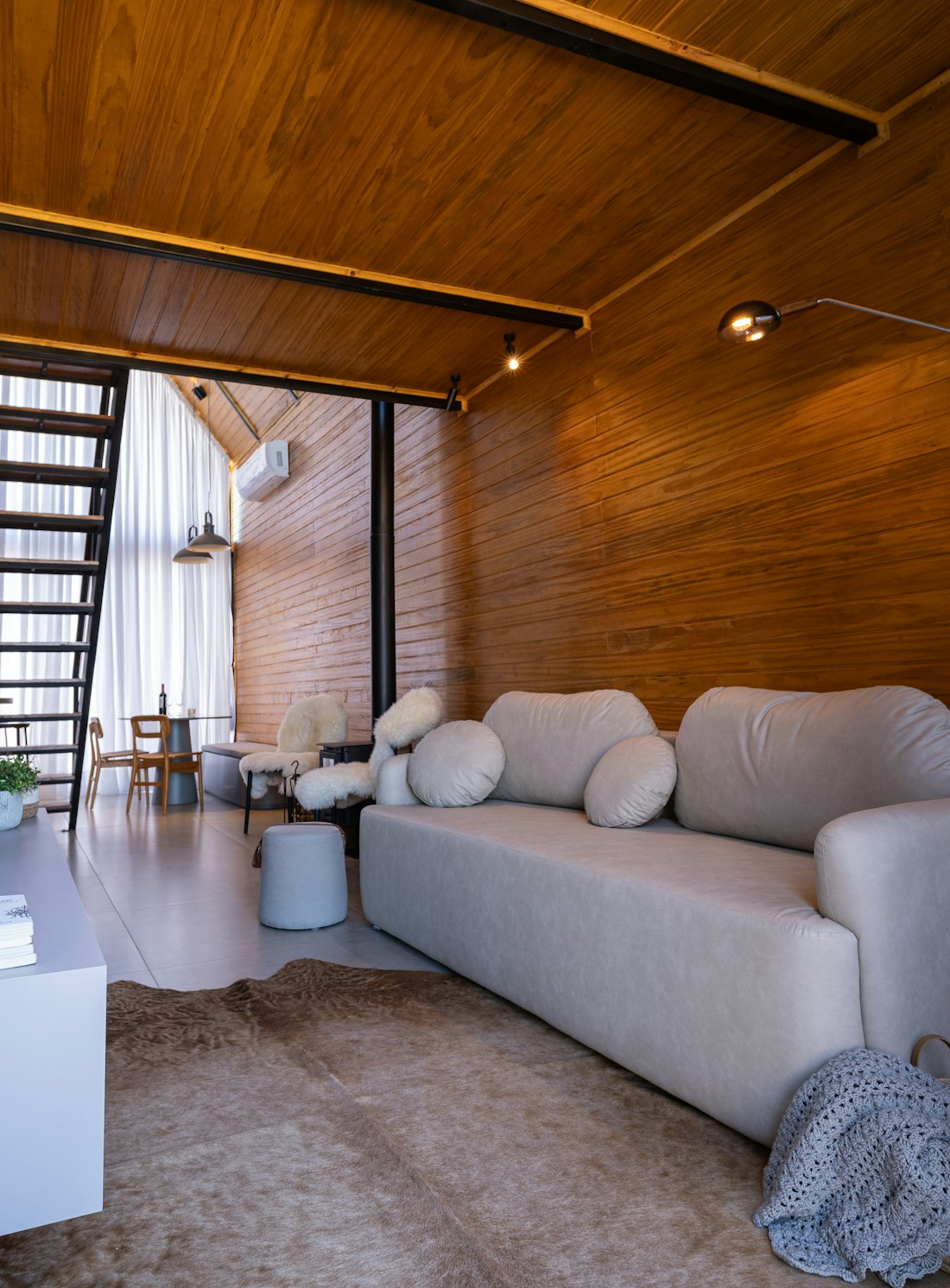 Existing wood-lined hospitality living room