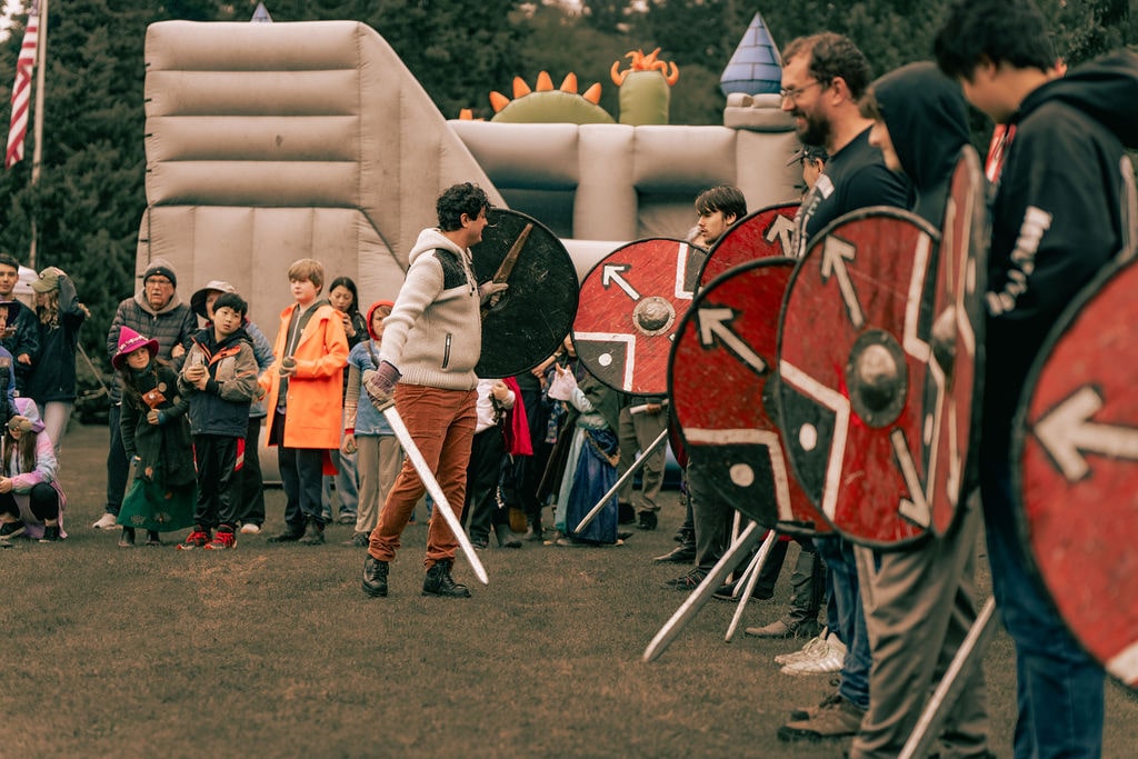 Knight demonstration lineup with shields and swords at wrf