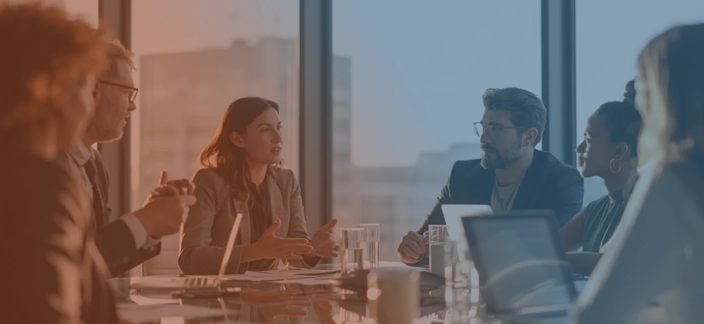 Staffing Executive Recruiters at table in meeting
