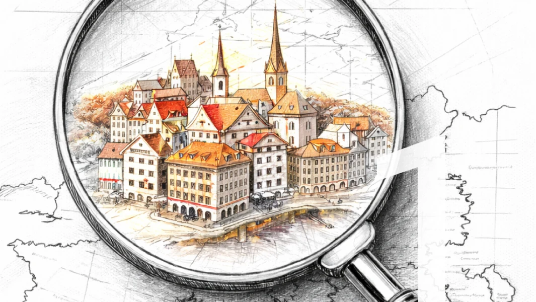 Illustration of a quaint town with red-roofed buildings and churches, viewed through a magnifying glass, highlighting architectural details.