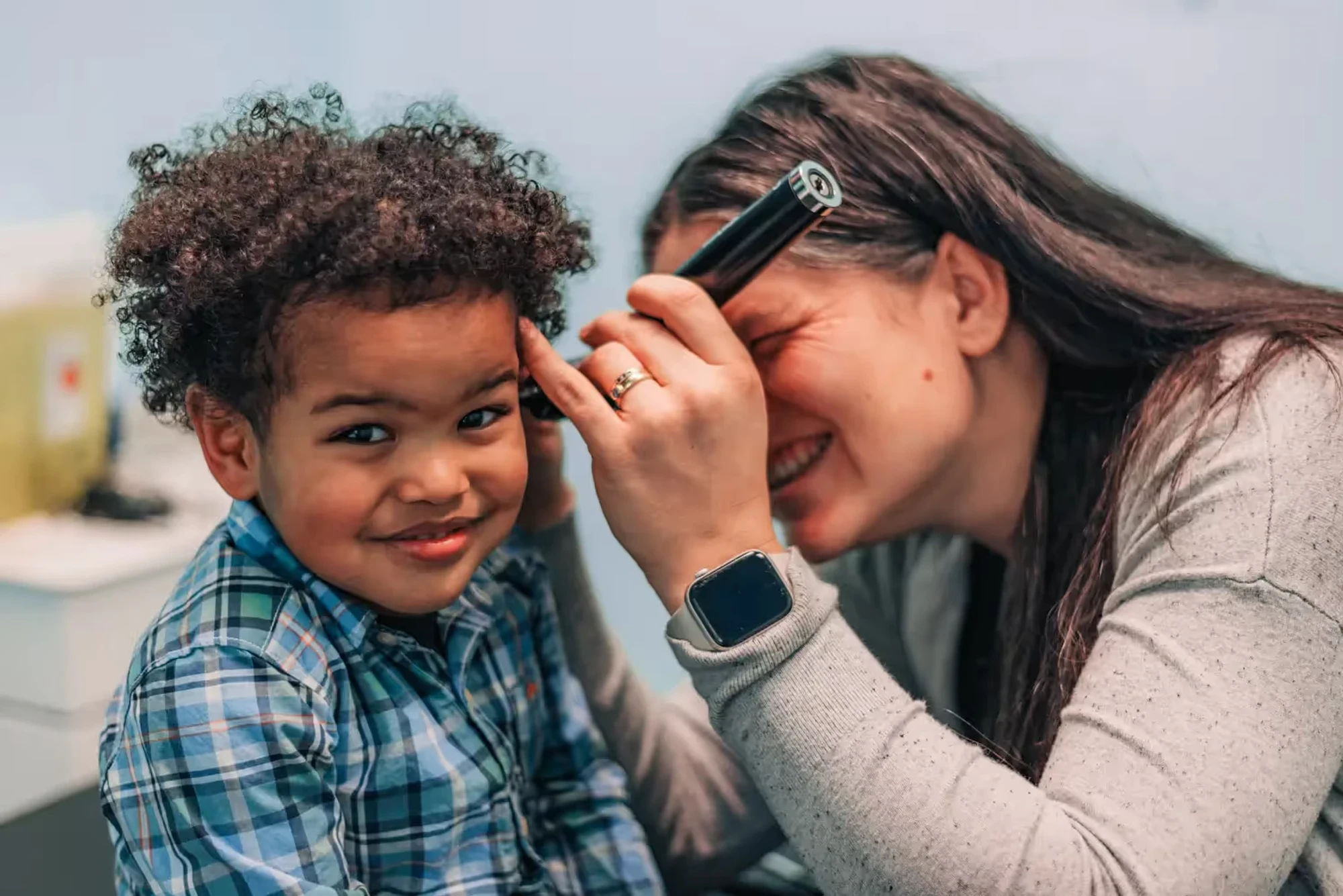 Healthcare professional conducting an ear examination