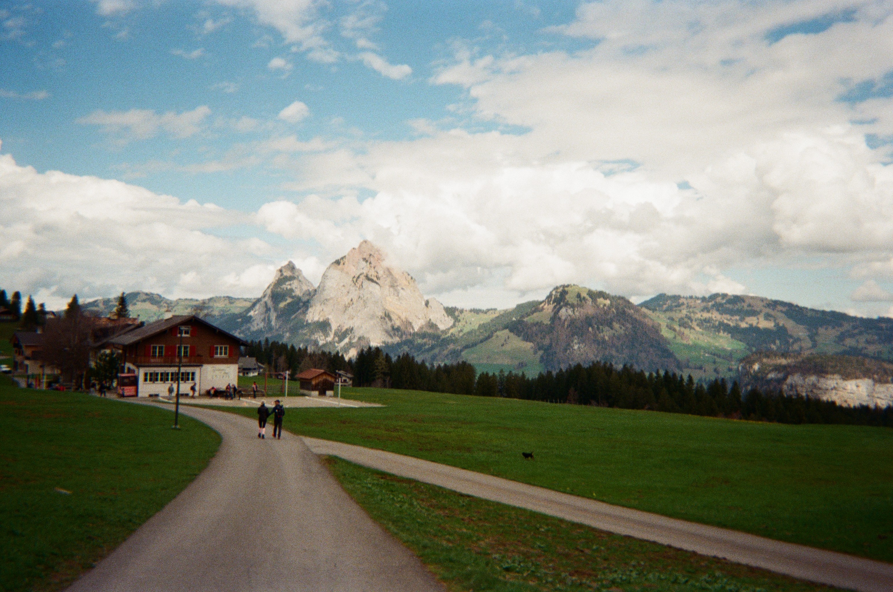 Mountain range beneath soft clouds