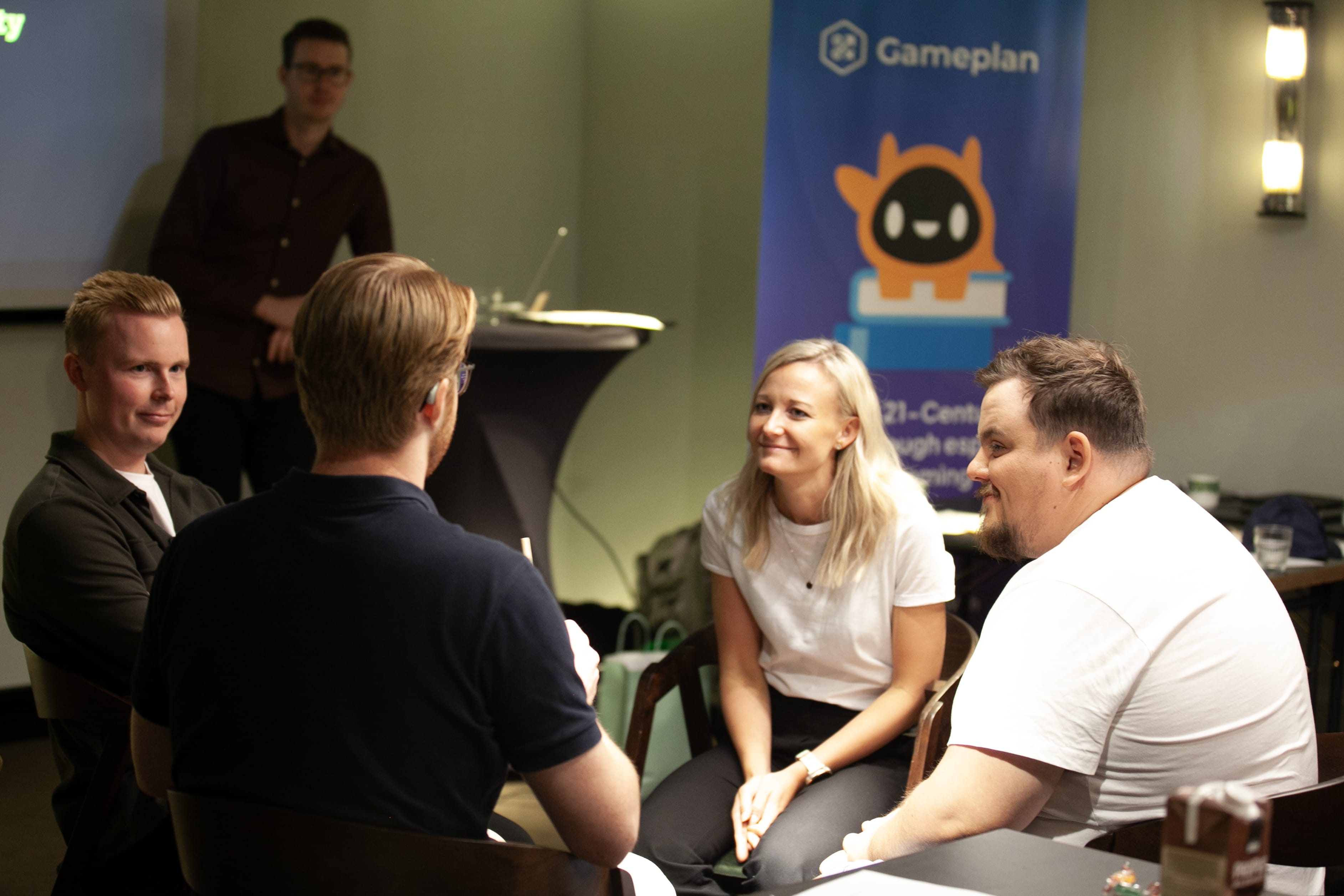 Gameplan employees having a discussion