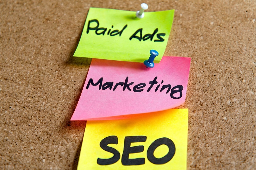 Paid ads vs SEO - Post its on board