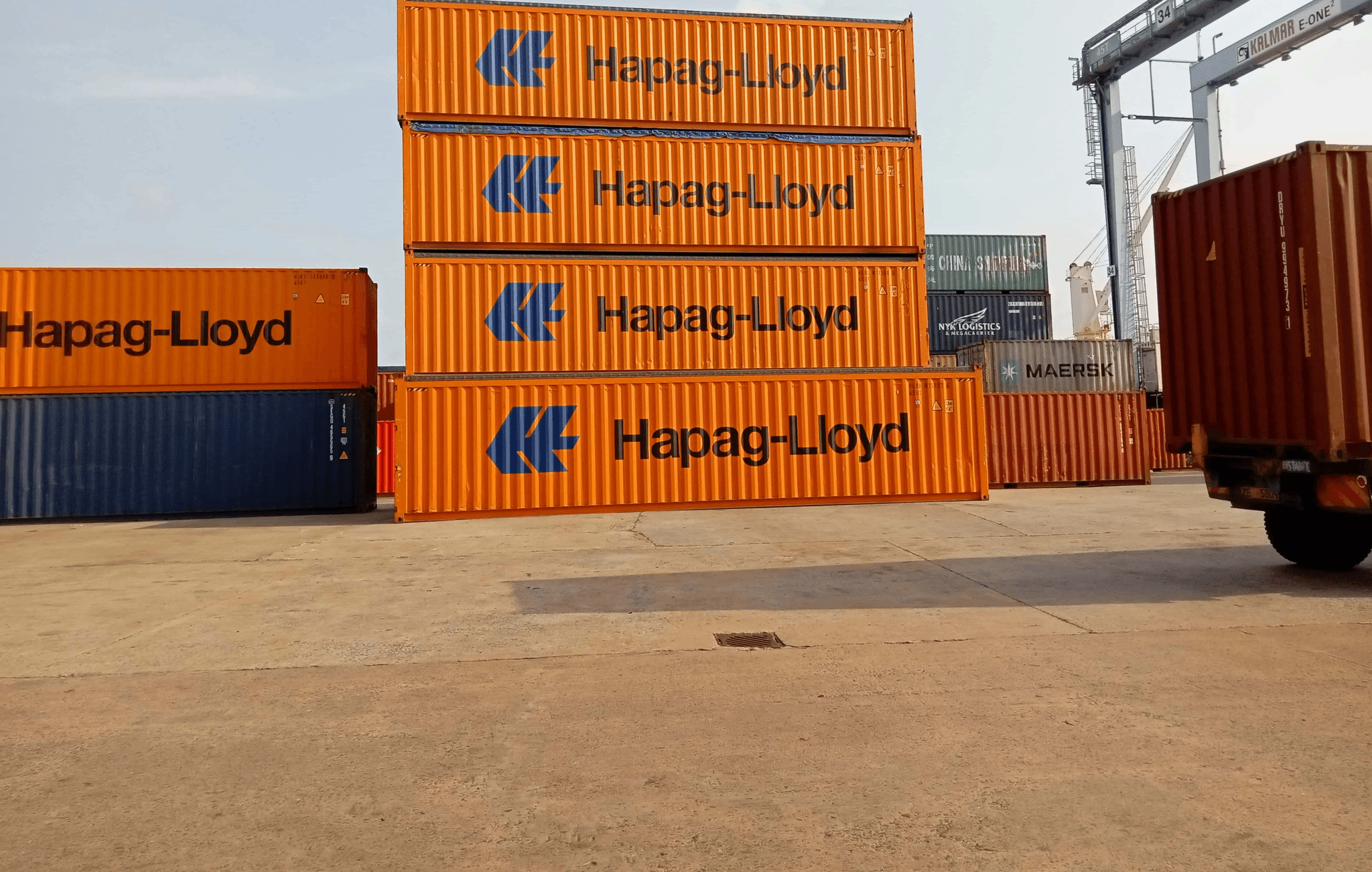 Shipping containers used to illustrate real-world mold testing conditions during global transit