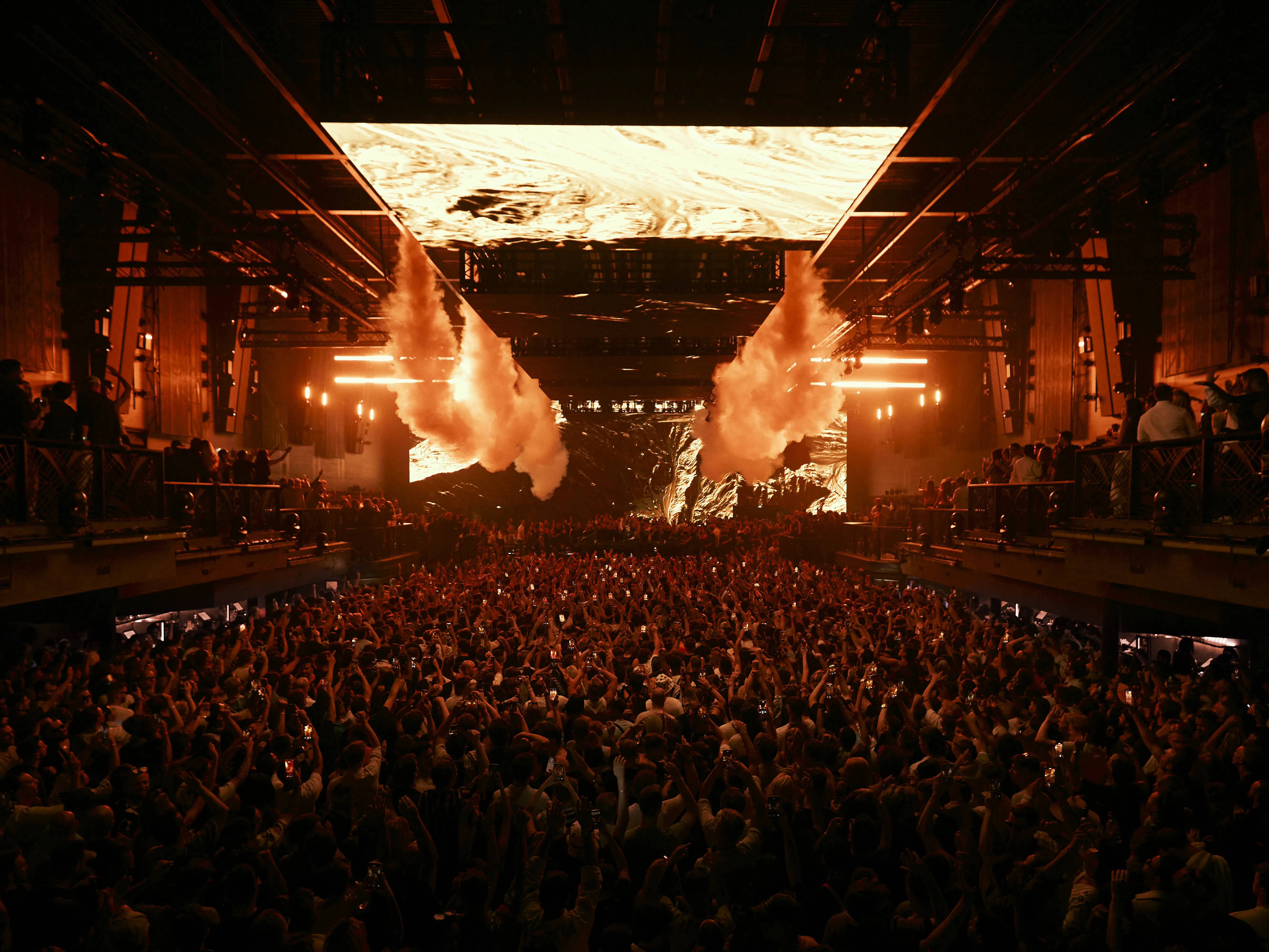 Abstract black ink splatter on white background.