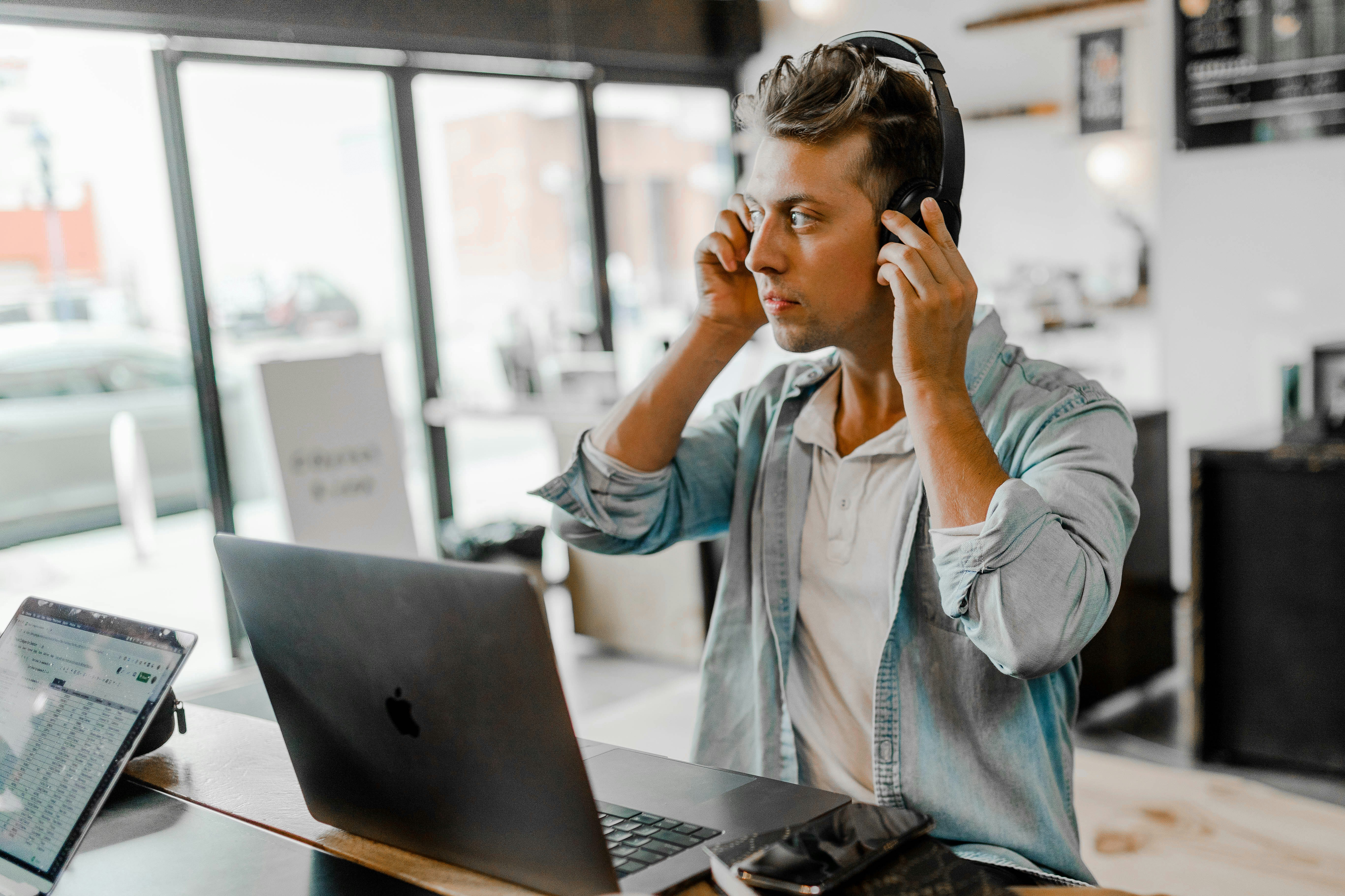 man looking at results for PDF to Audiobook