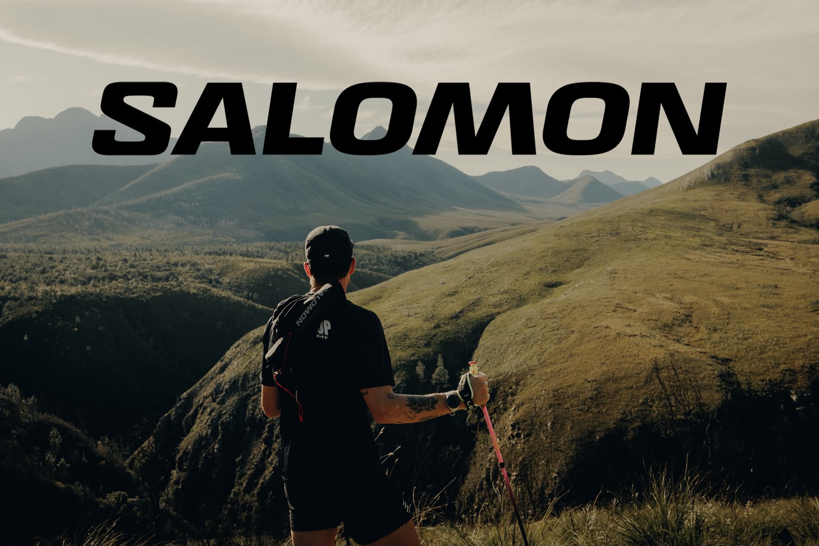 Johnny Wolf running towards the moutnains using rekking poles during the Tsitsikamma Ultra