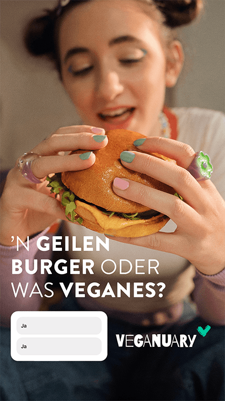 Close-up of a young woman eating a plant-based burger as part of a social-first Veganuary campaign.
