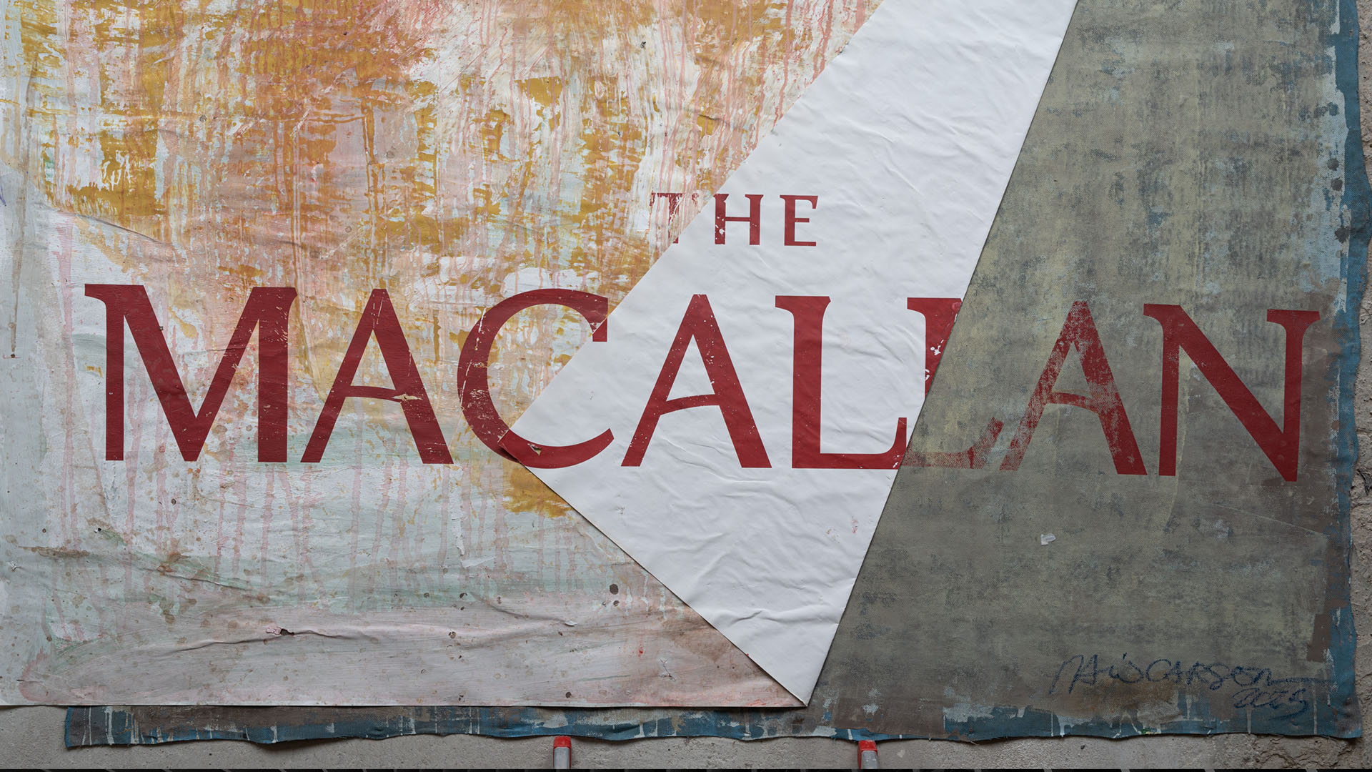 Streetside billboard with flyposters of the Batch.Works brand and illustrations