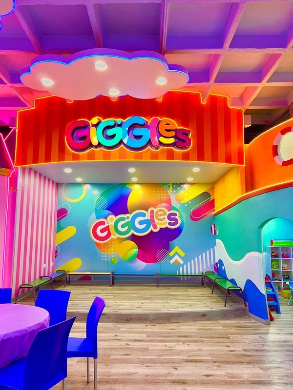 A young girl smiling