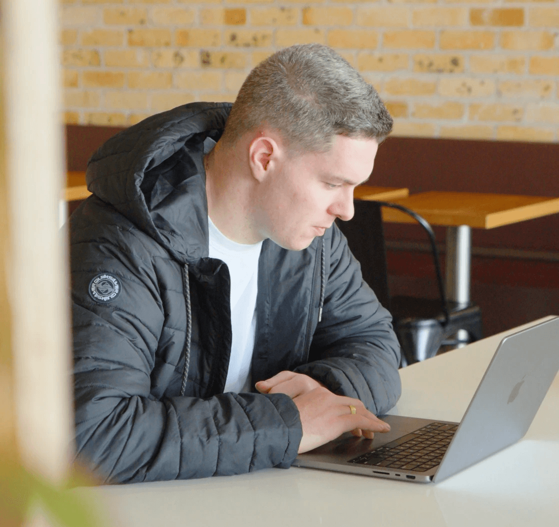 Photo of Jacob on an Ipad Answering Questions