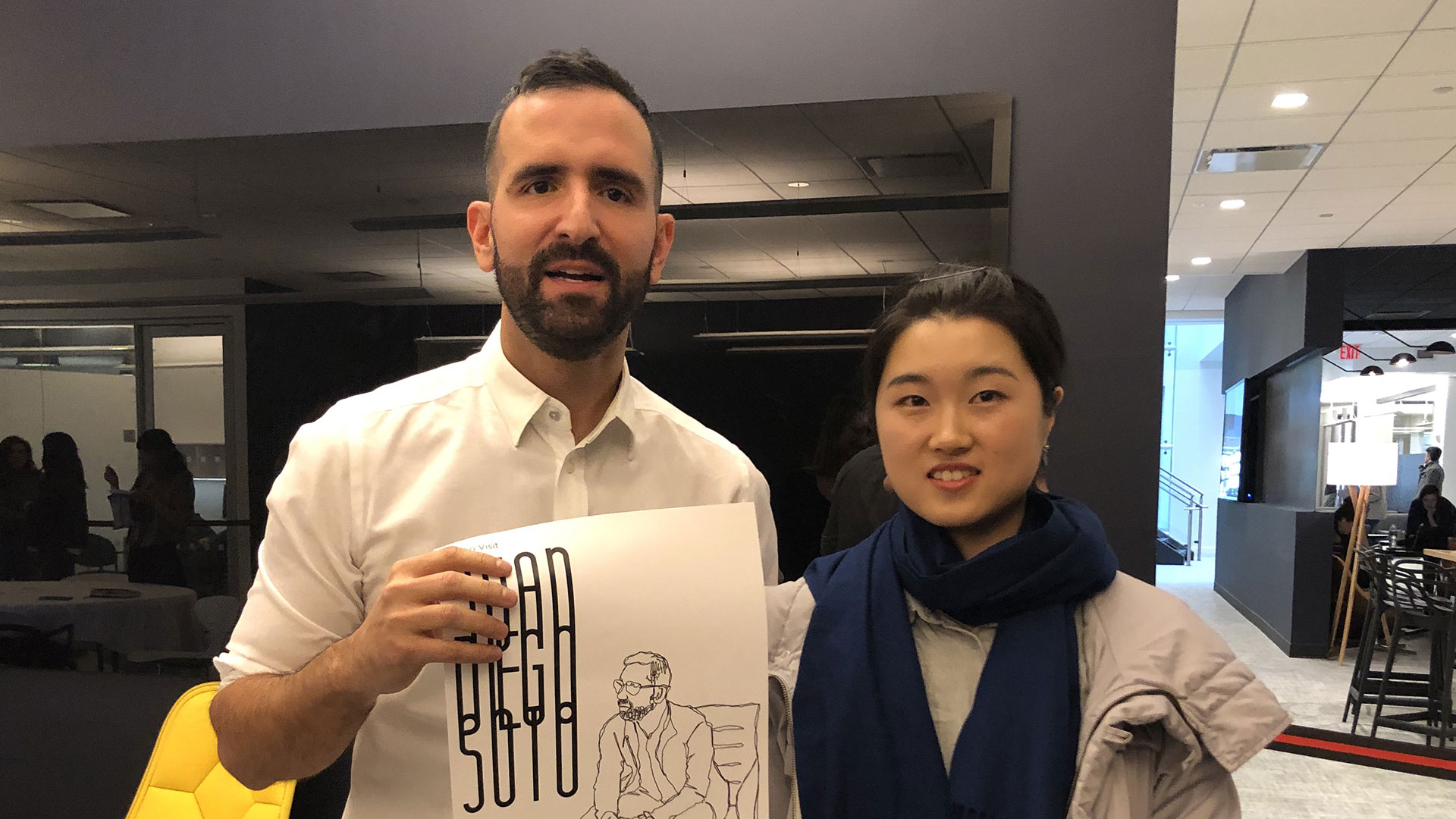 Juan Diego Soto at FCB with a student