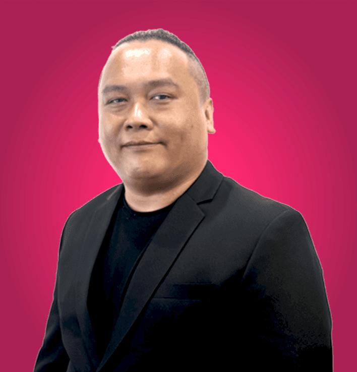 Darcy Reburiano, Executive Assistant at CSM, side profile portrait wearing a black suit