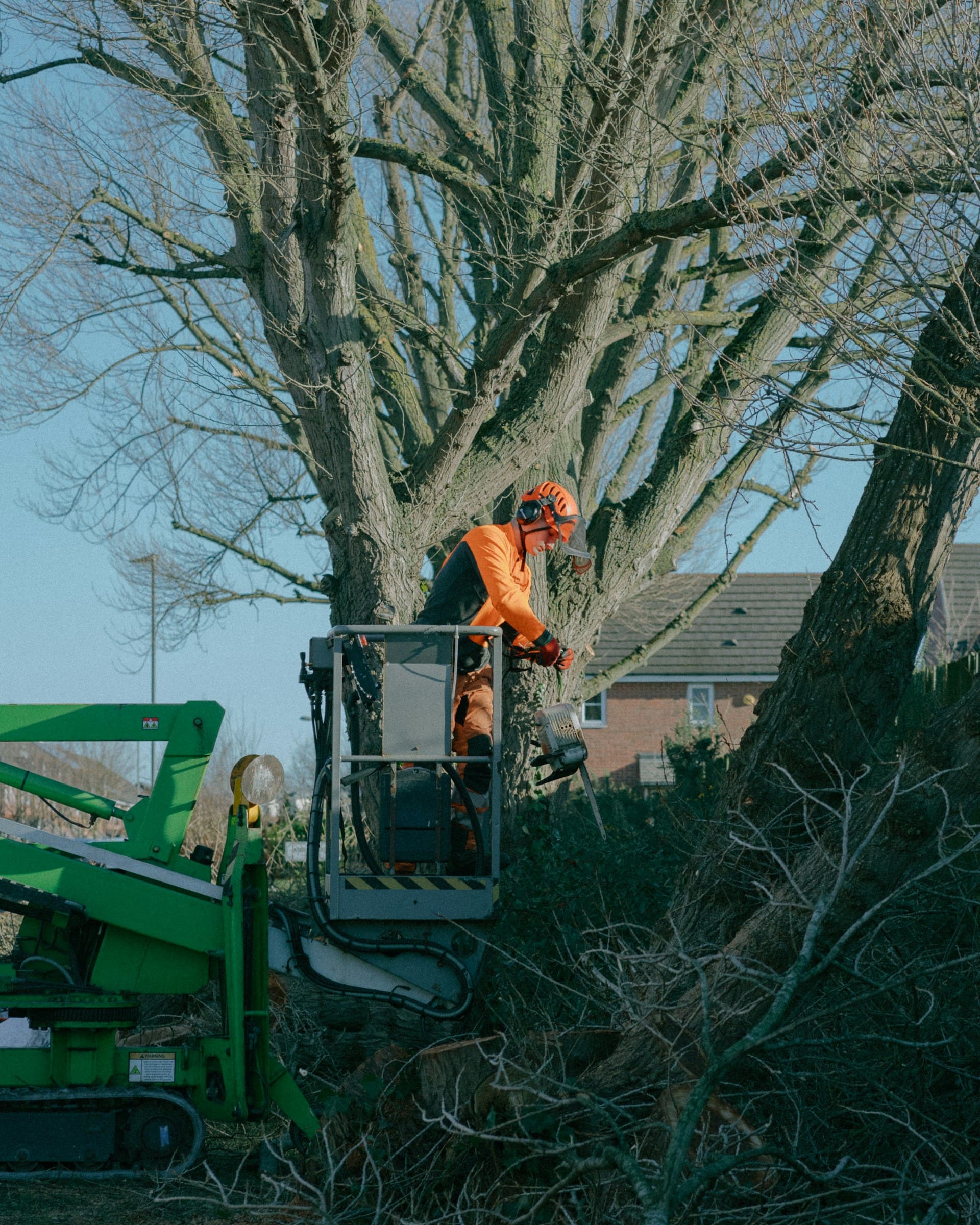 A man on a roof working on a roof