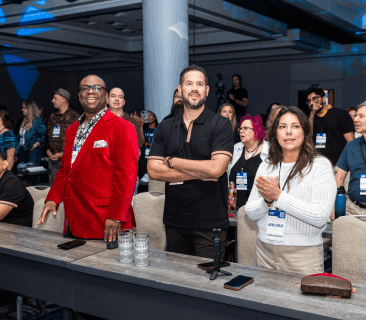 A Man Talking using Microphone in the Conference Room