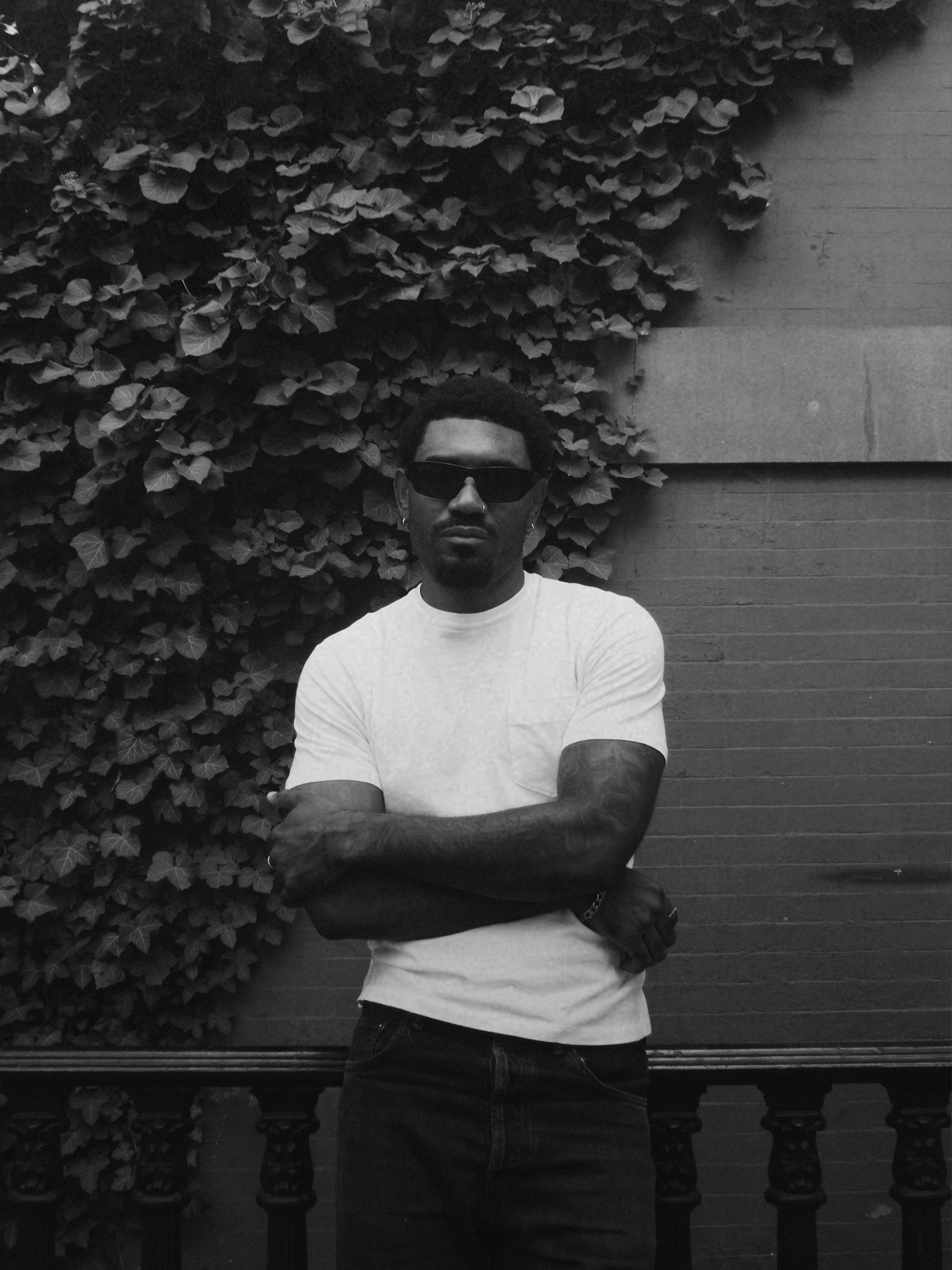 a blurry photo of a person standing in front of a wall