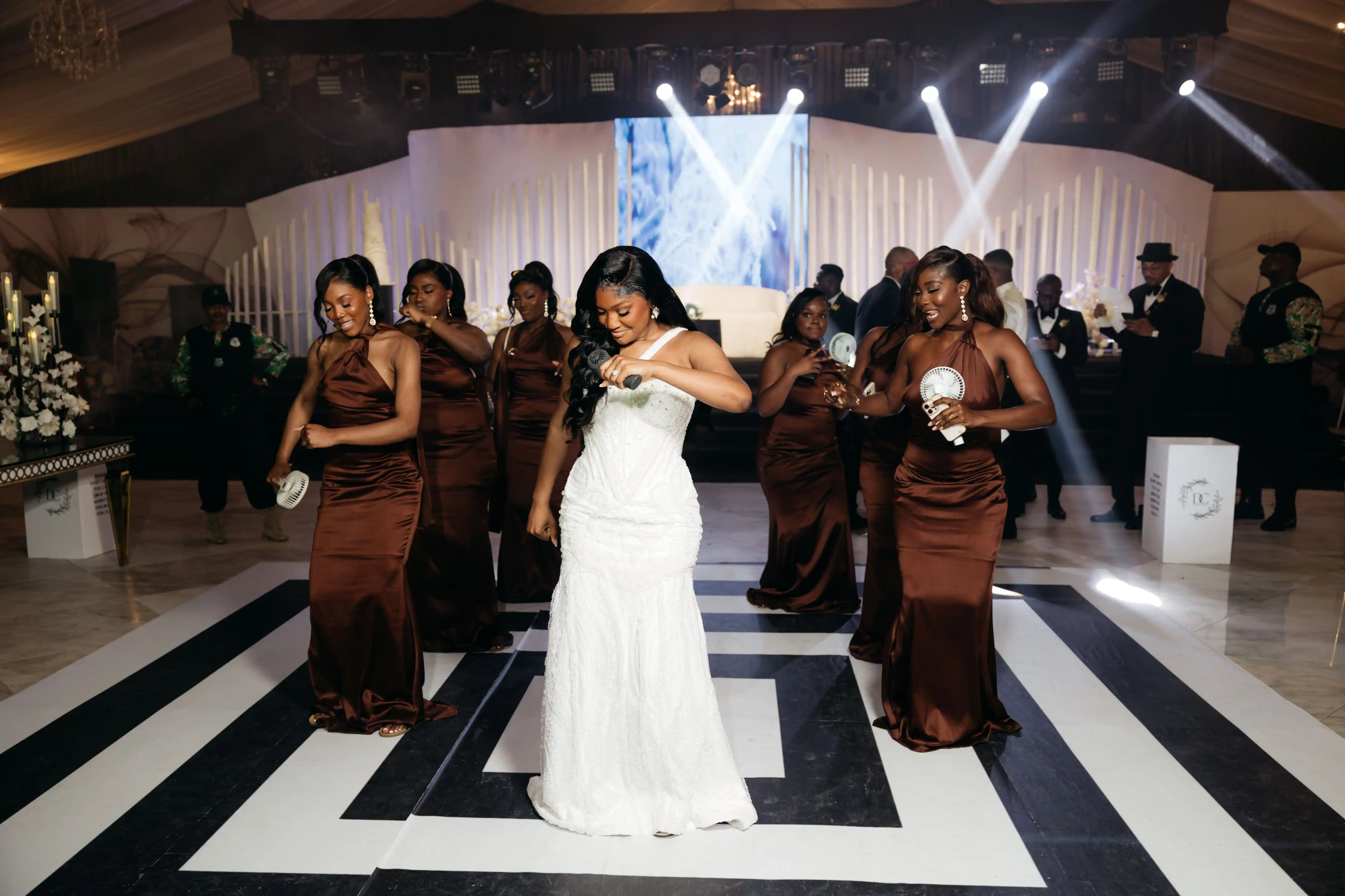 Bride and groom celebrating a luxury wedding coordinated by Victoria Brooks Events, a premium wedding planner in Nigeria.