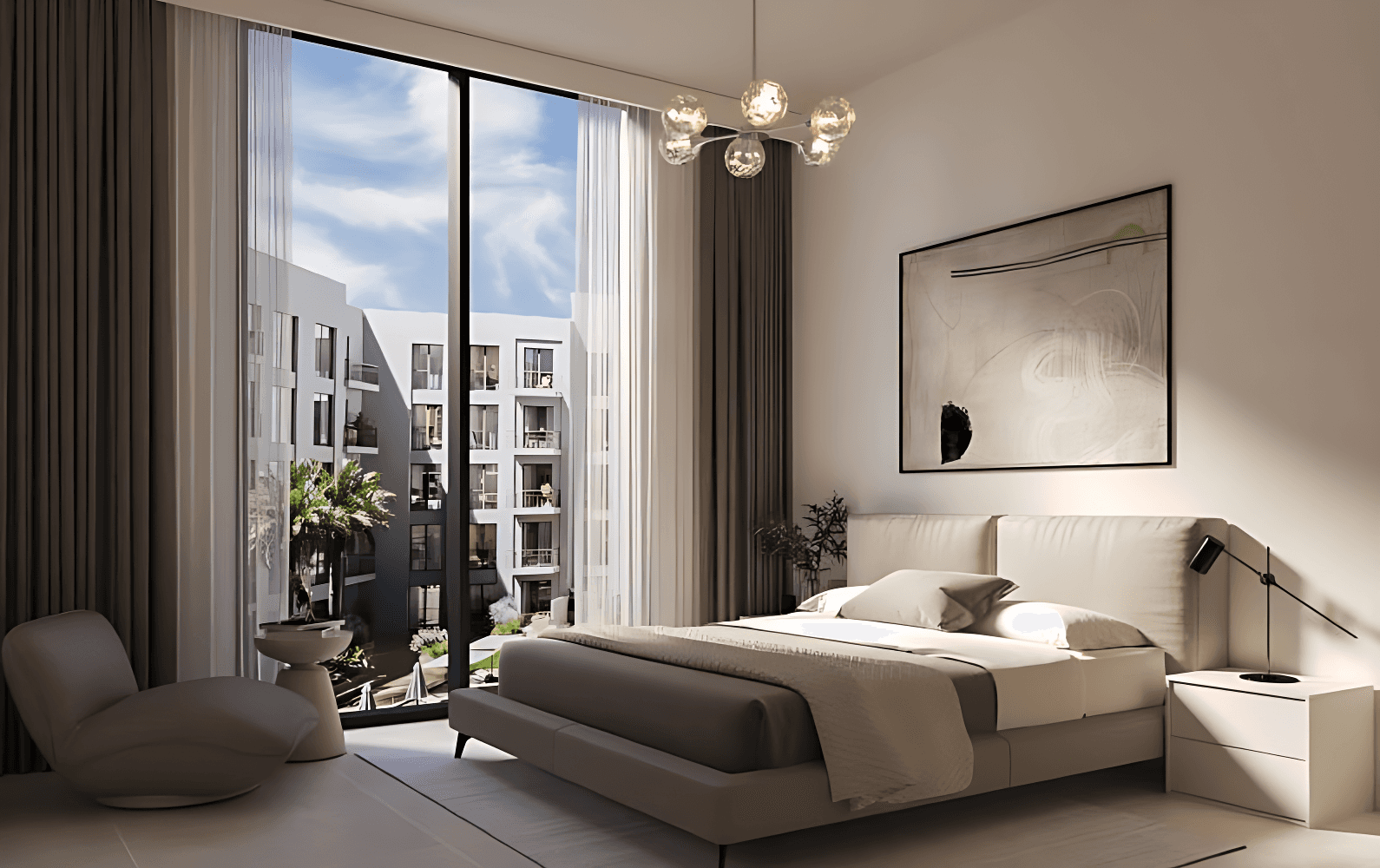 A modern bedroom featuring a bed, dresser, and television in the Ascot Residences.